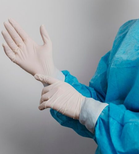 young-doctor-wearing-surgical-gloves_23-2148847157